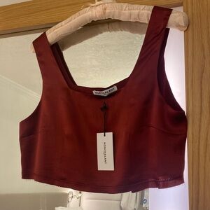 Nonchalant crop top brand new with tags wine color .